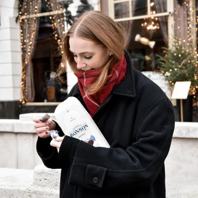 girl eating brownie granola bonbon